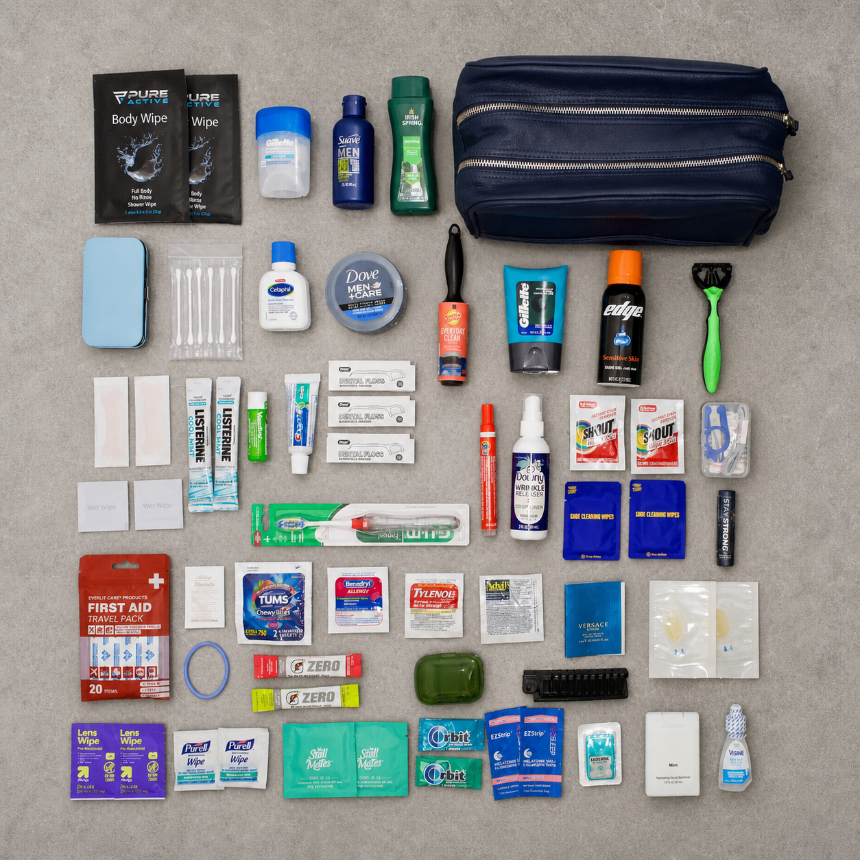 Men’s travel essentials organized by category for grooming, wellness, and carry-on travel